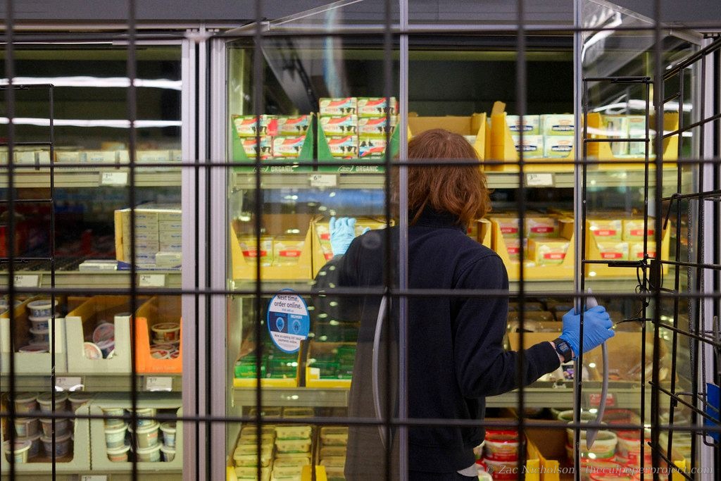 Stocking butter, Aldi grocery store, 2026